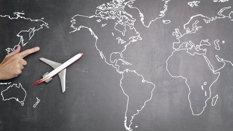 Avion sur carte monde